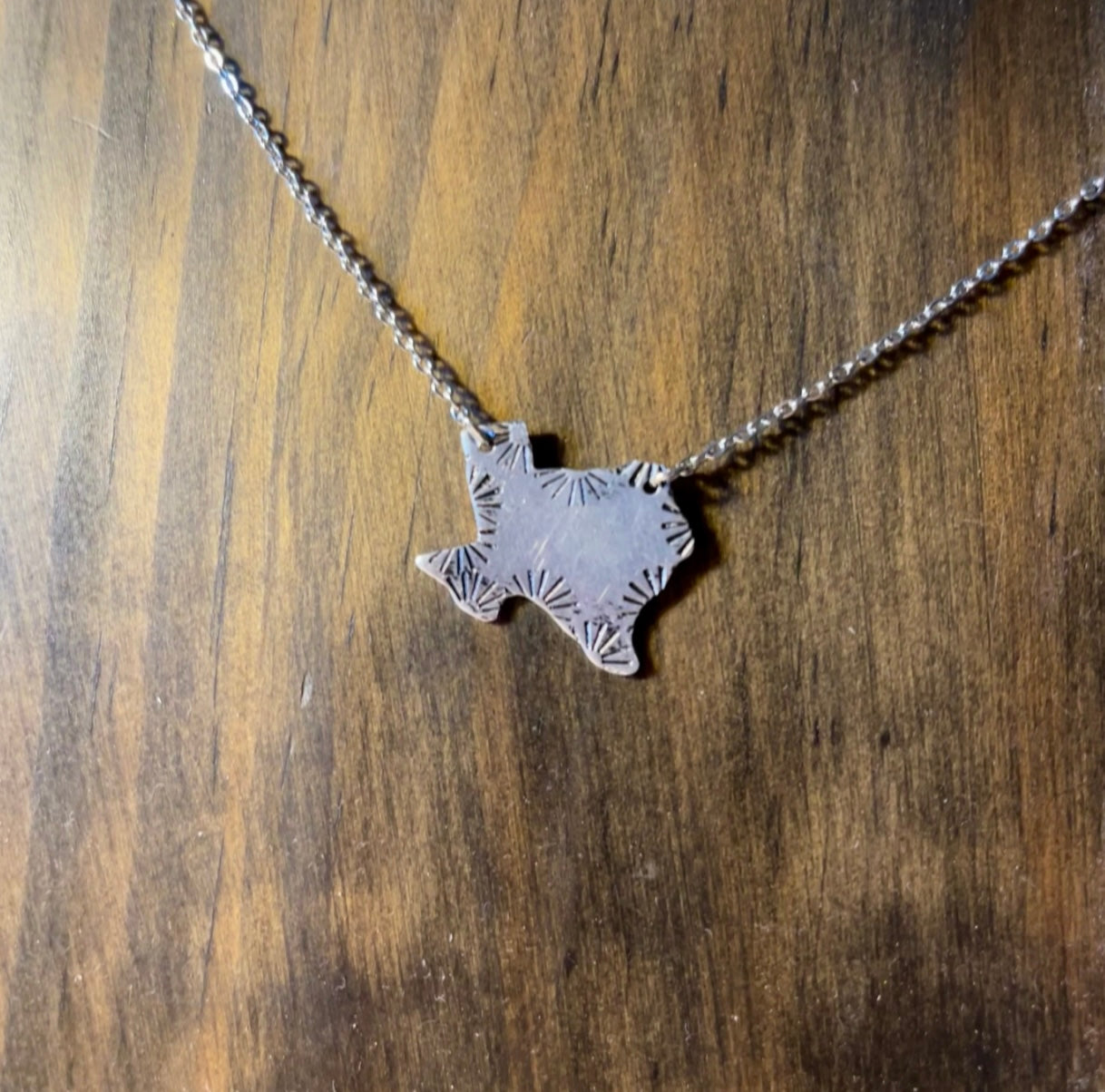 small tx necklace